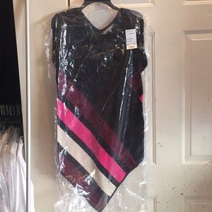 A brand new medium poncho.